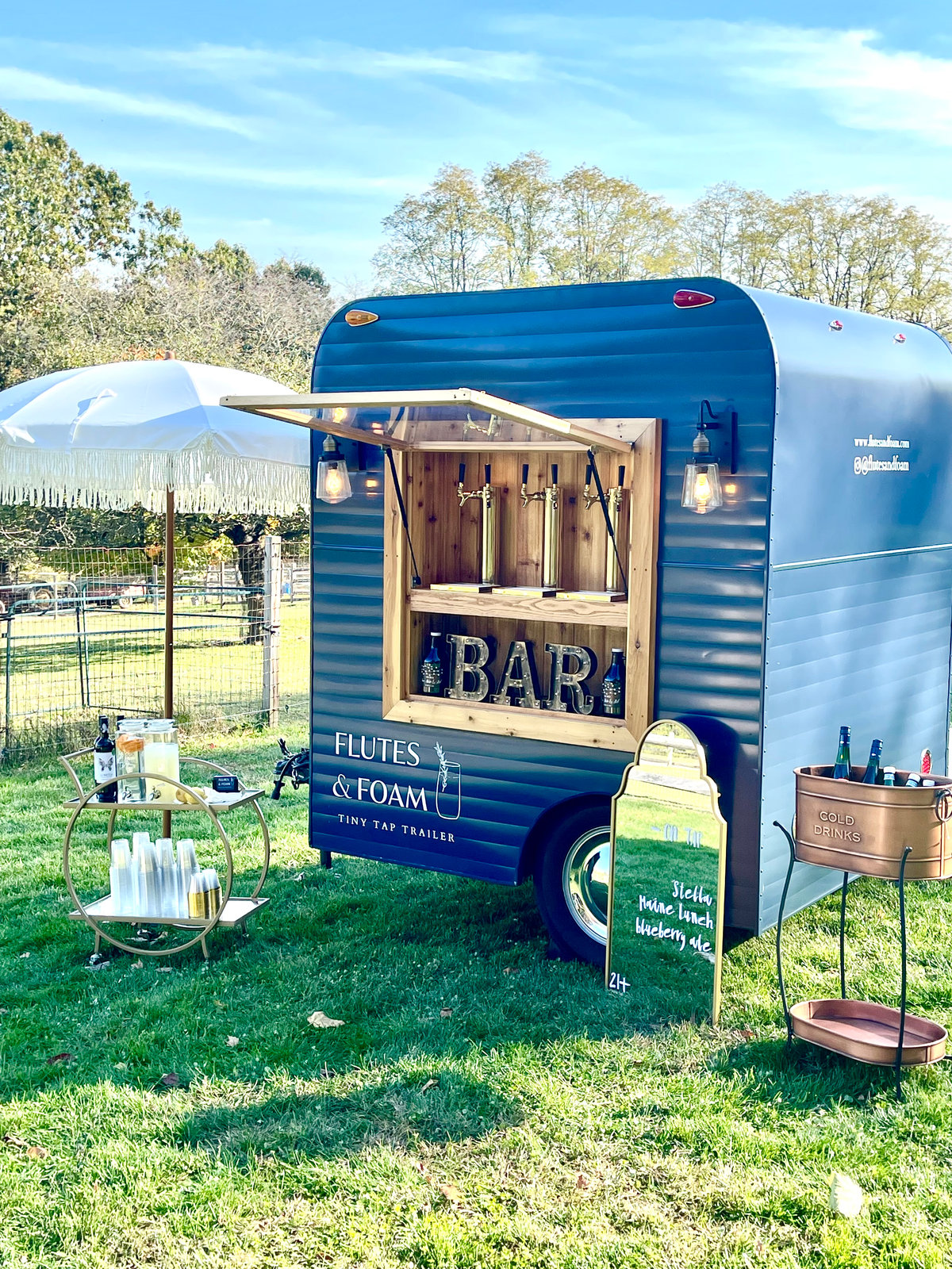 Flutes & Foam mobile tap trailer set up outdoors